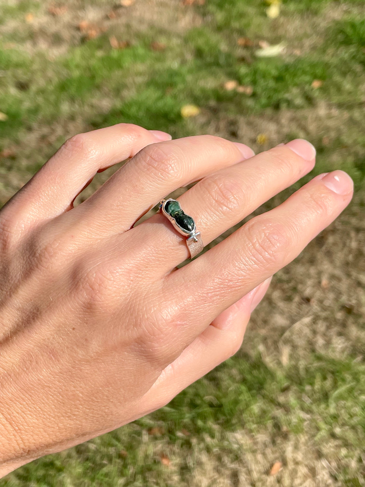 Emerald east/west Ring size 8