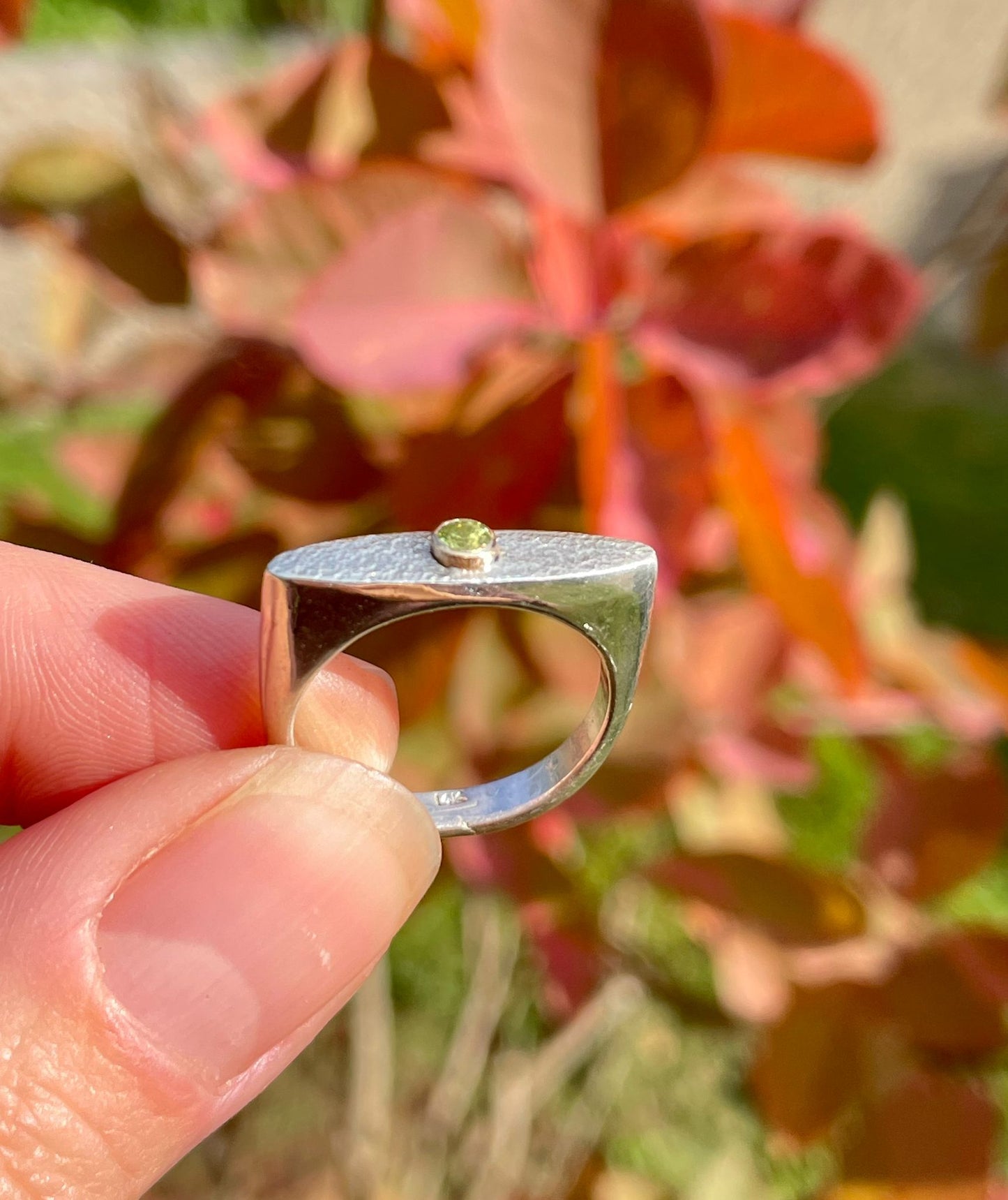 Silver and 14k gold peridot ring